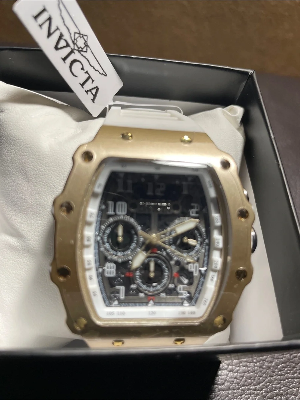 Invicta Gold and White Chronograph Watch with Black Dial